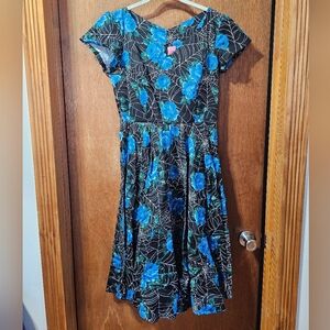 Vixen by Micheline Pitt Black Dress with Blue Floral Pattern